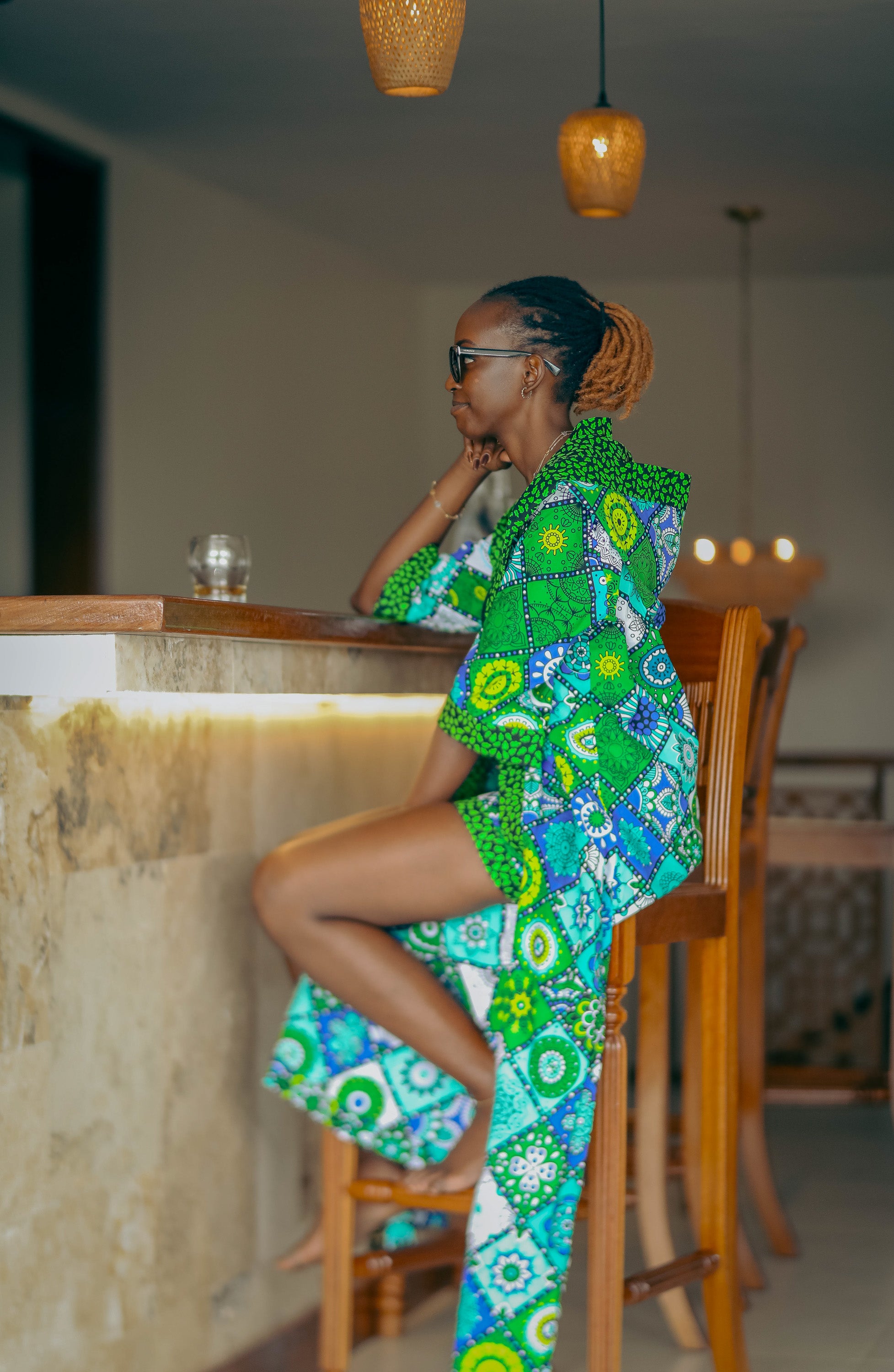 Ocean Teal African cover-up in cool teal tones worn by a woman