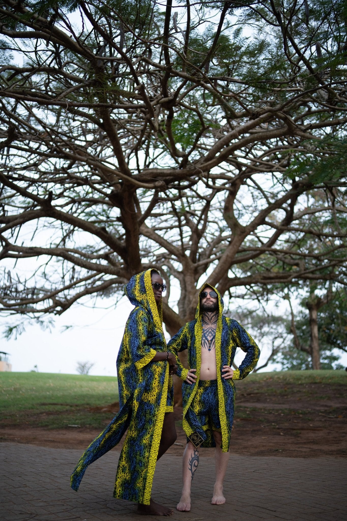 Electric Safari blue and yellow print resort shorts with deep pockets; bold African luxury beach outfit, hand-cut in Kenya