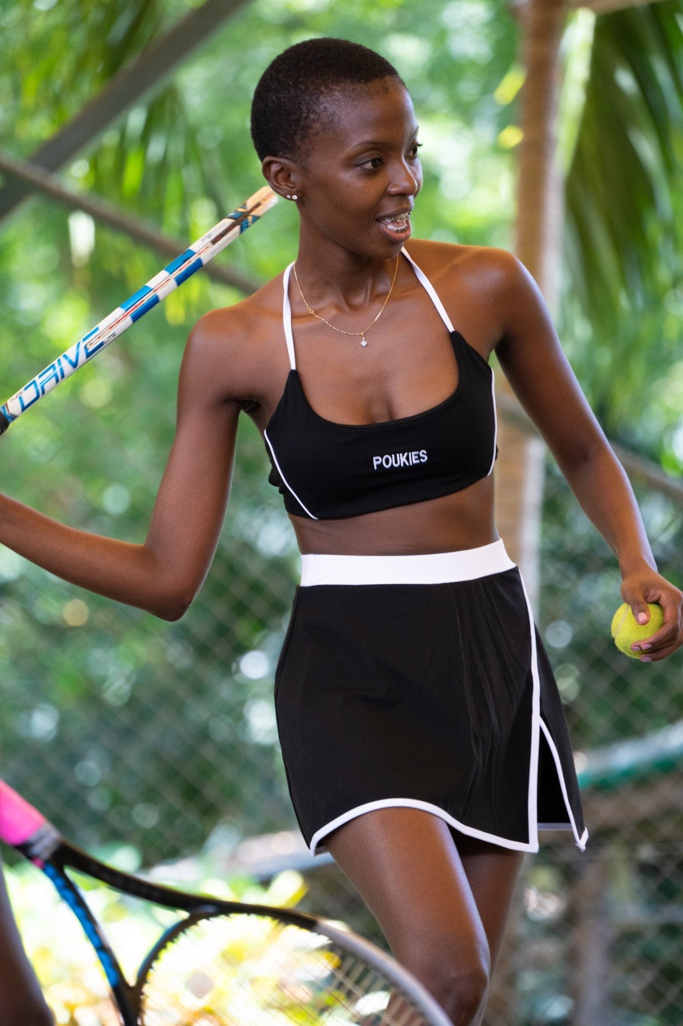 Poukies black tennis set for couples; coordinated sport-inspired activewear, gym to travel style