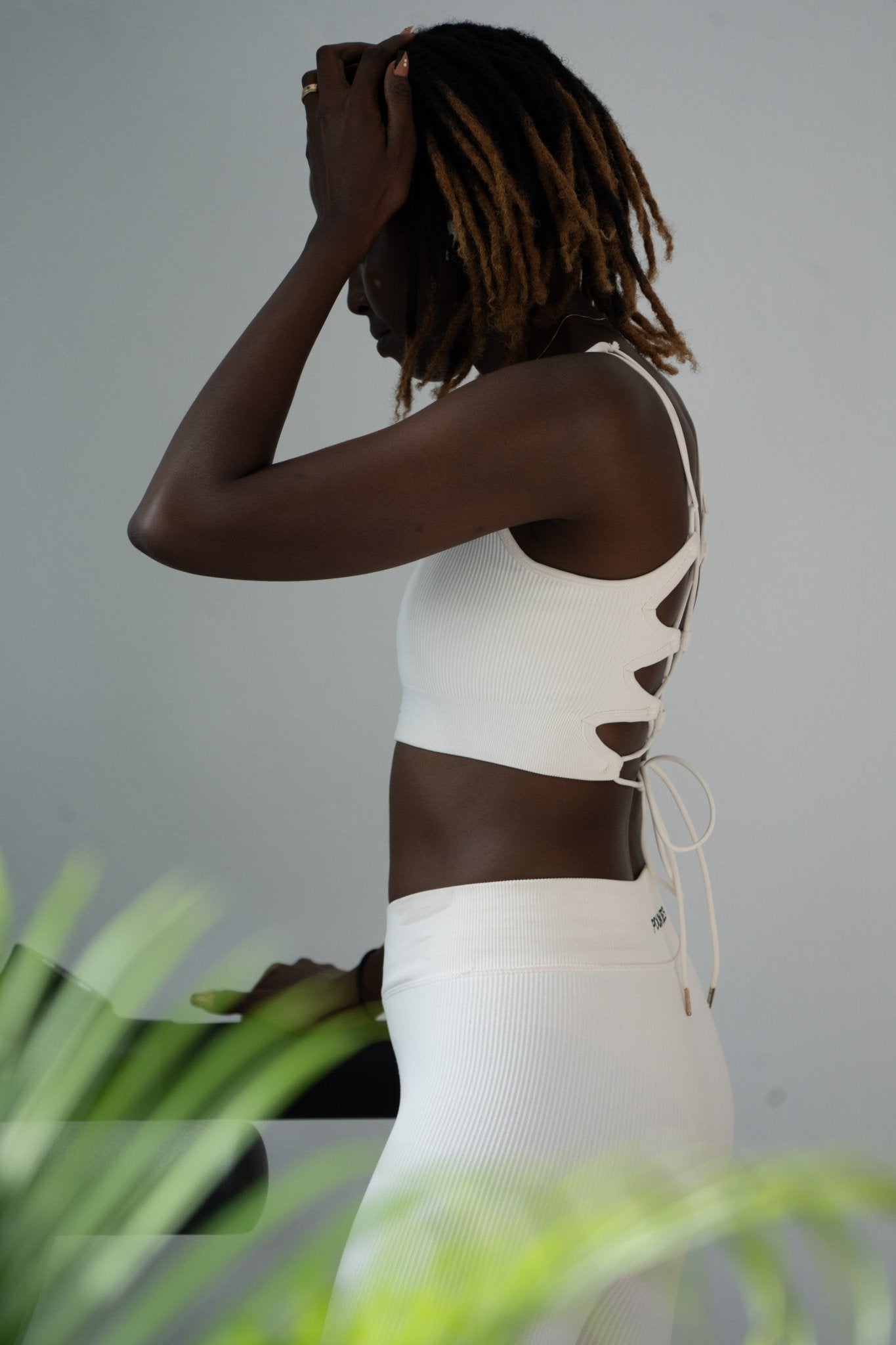 Poukies white gym set for couples; breathable matching top and bottoms, minimalist travel and resort activewear