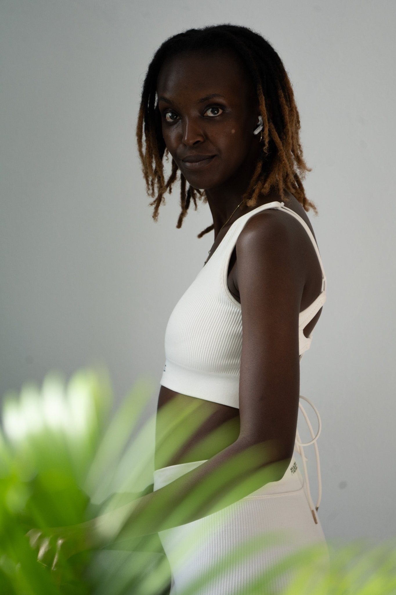 Poukies white gym set for couples; breathable matching top and bottoms, minimalist travel and resort activewear