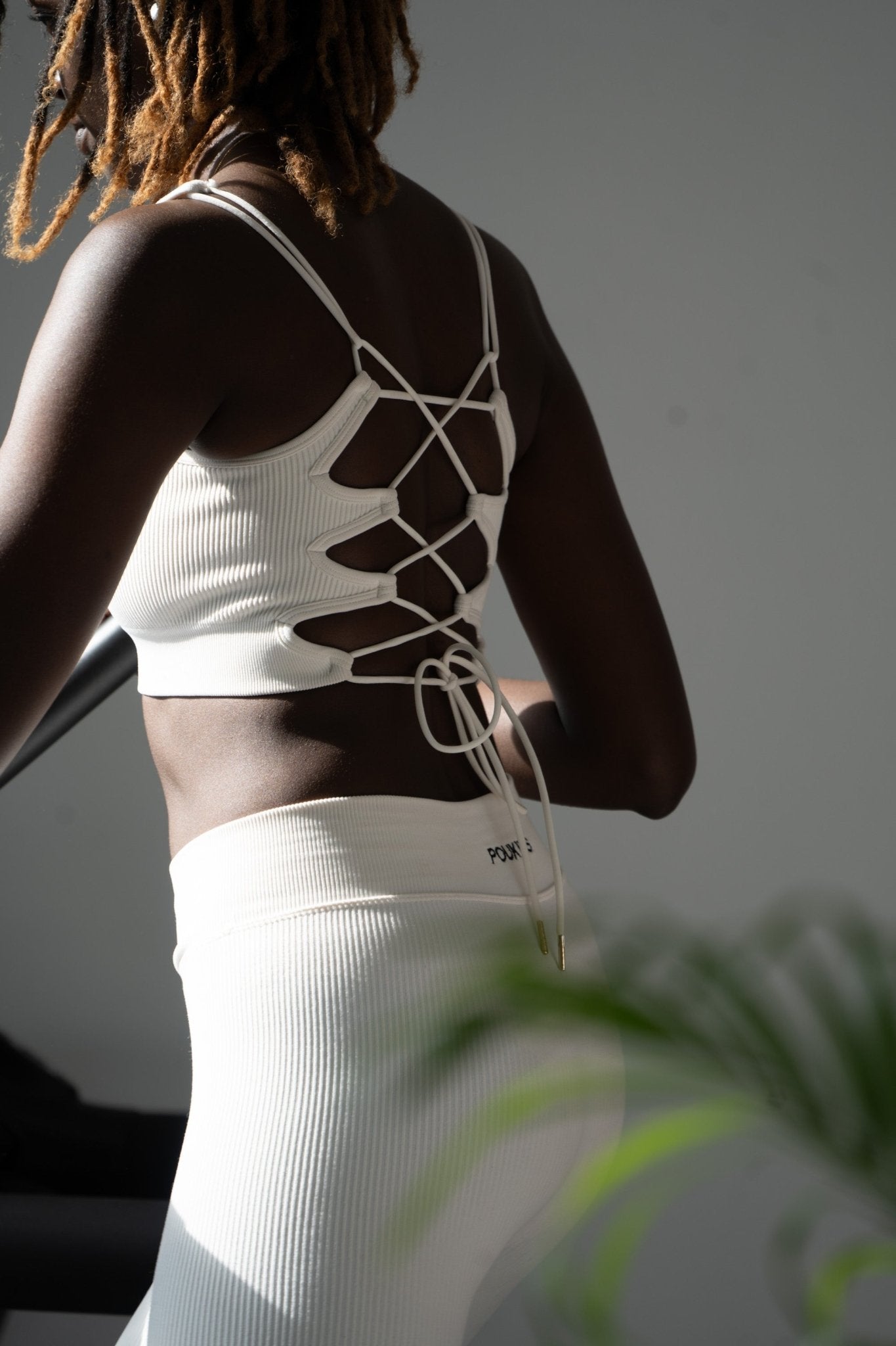 Poukies white gym set for couples; breathable matching top and bottoms, minimalist travel and resort activewear