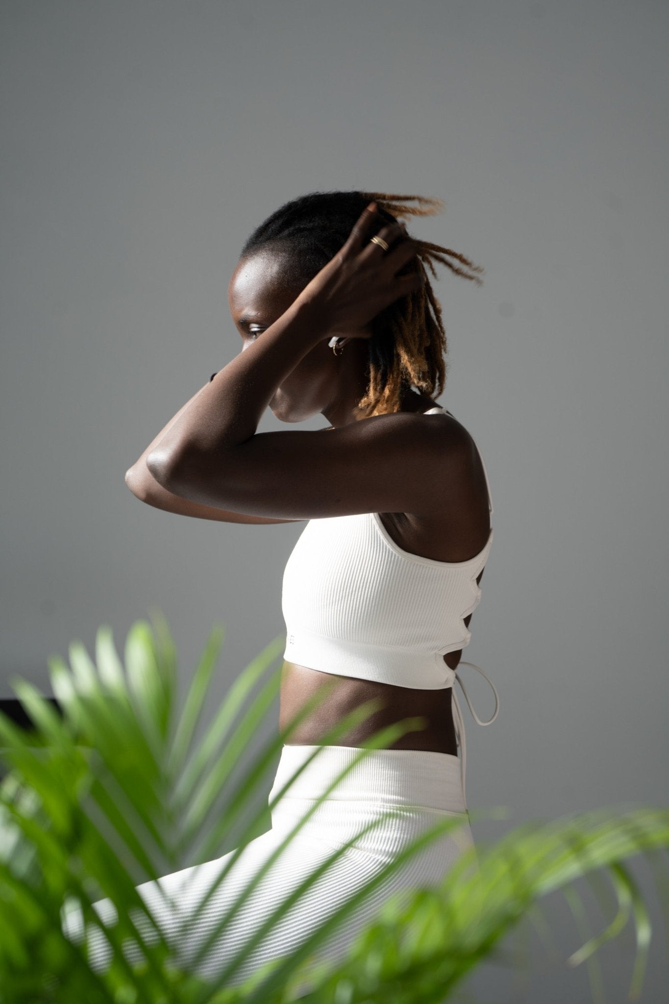 Poukies white gym set for couples; breathable matching top and bottoms, minimalist travel and resort activewear