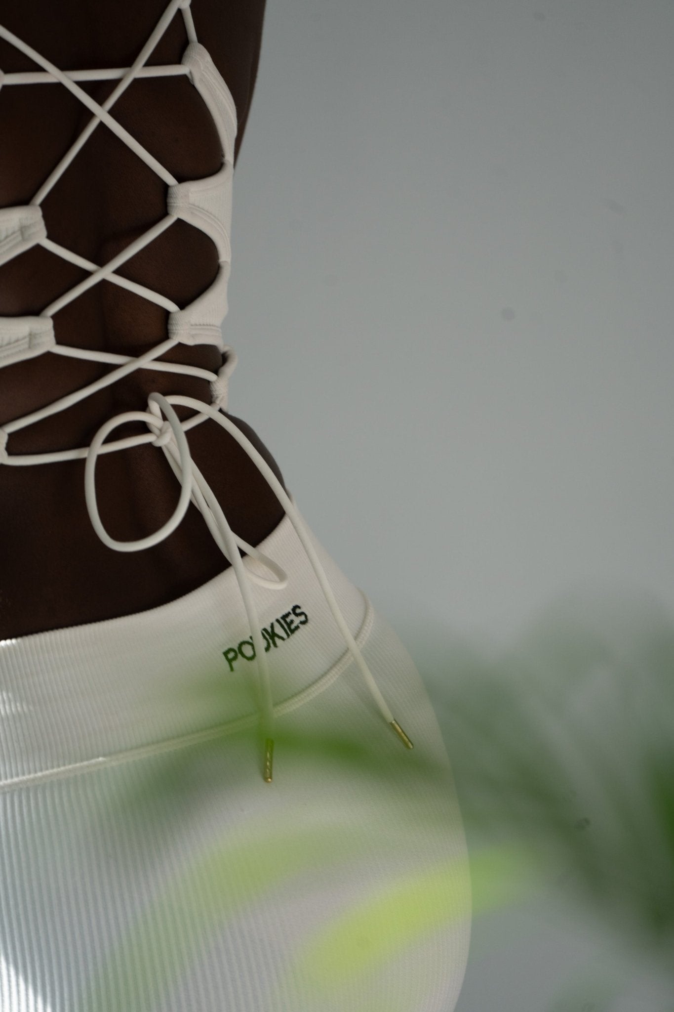 Poukies white gym set for couples; breathable matching top and bottoms, minimalist travel and resort activewear