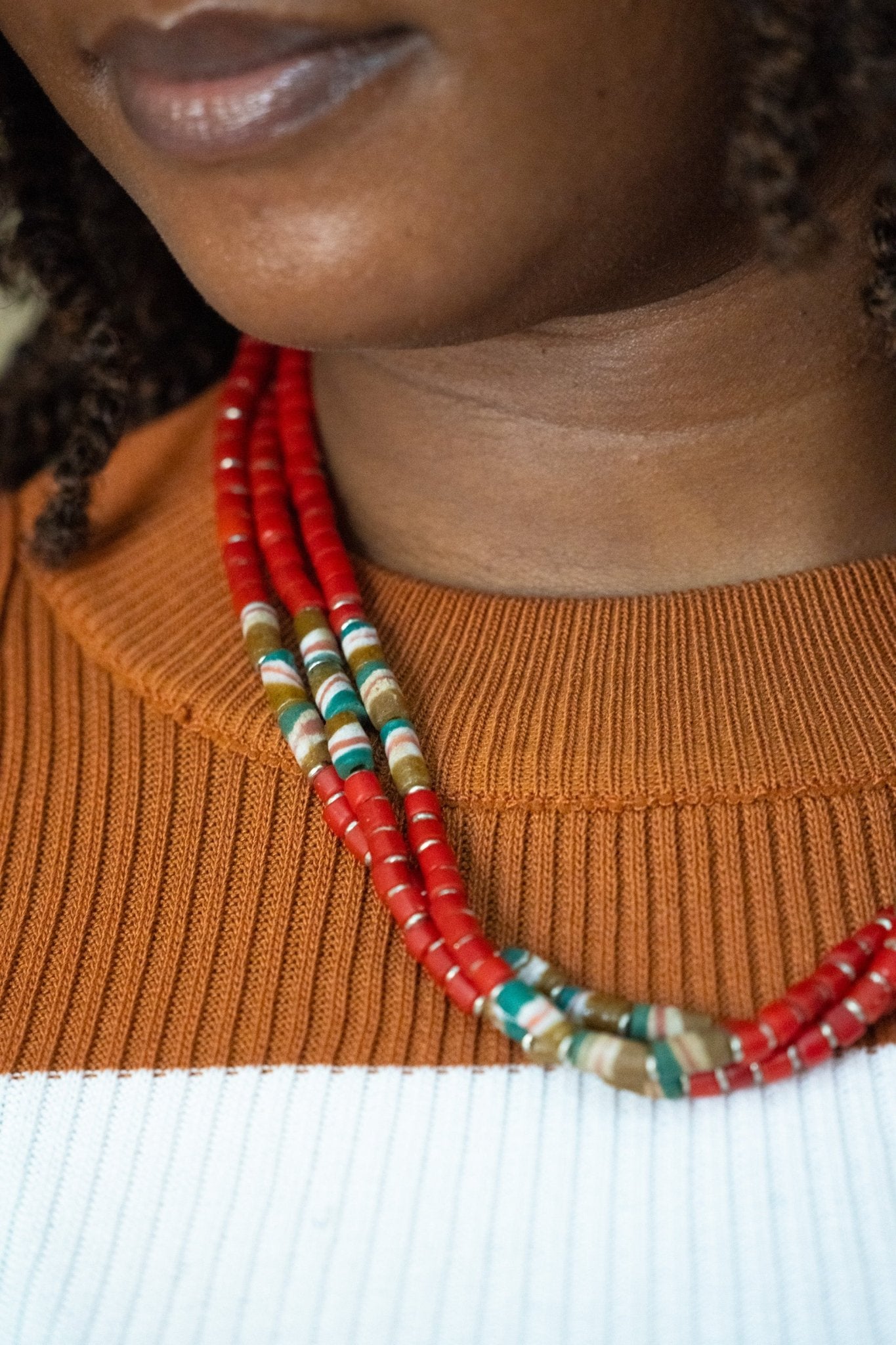 Red earth tone African bead necklace with clip-on back; handcrafted in Kenya, elegant accessory for resort and party wear