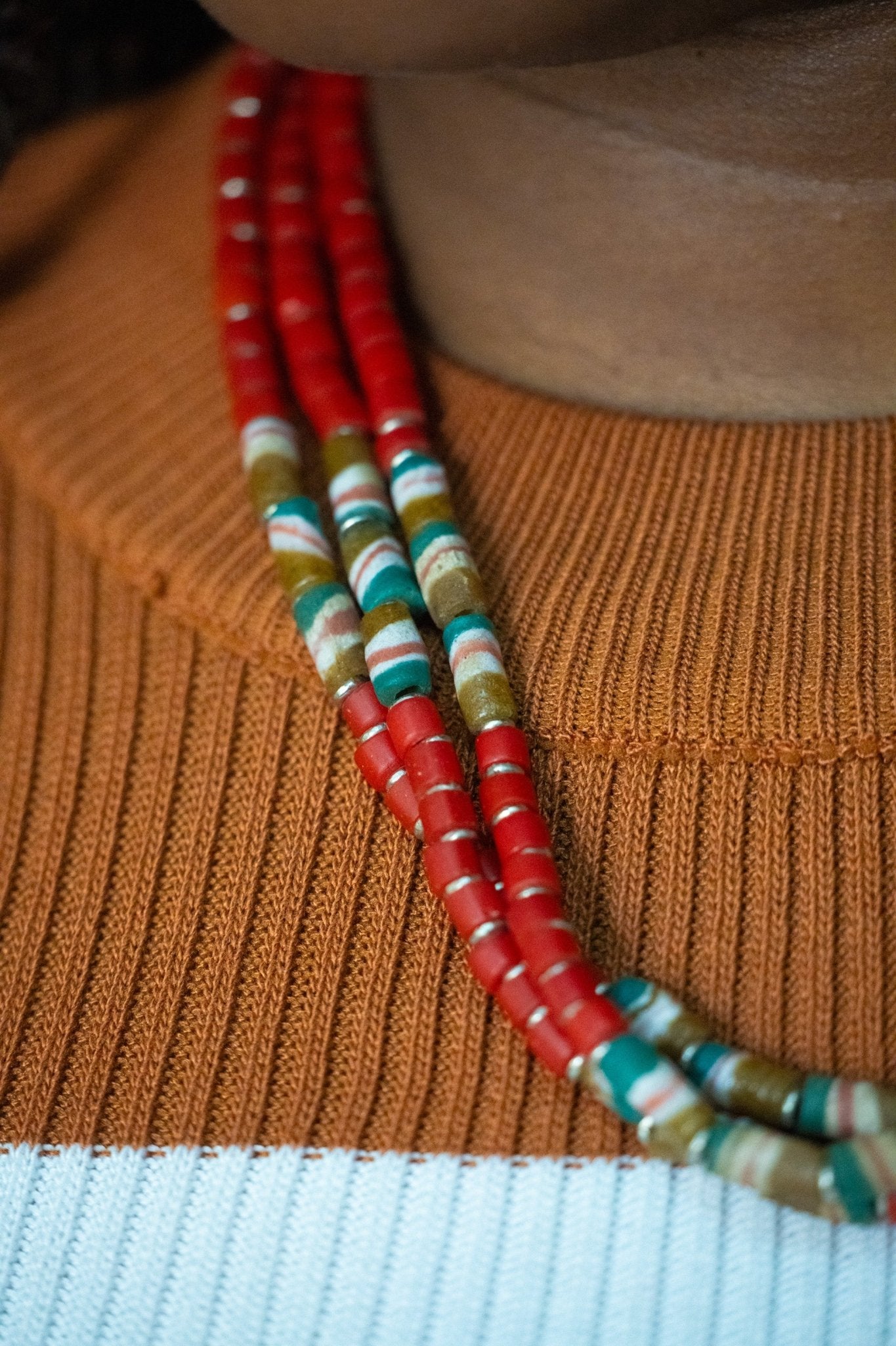 Red earth tone African bead necklace with clip-on back; handcrafted in Kenya, elegant accessory for resort and party wear