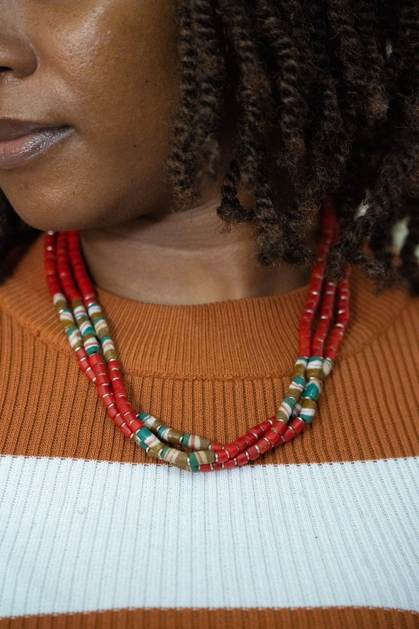 Red earth tone African bead necklace with clip-on back; handcrafted in Kenya, elegant accessory for resort and party wear