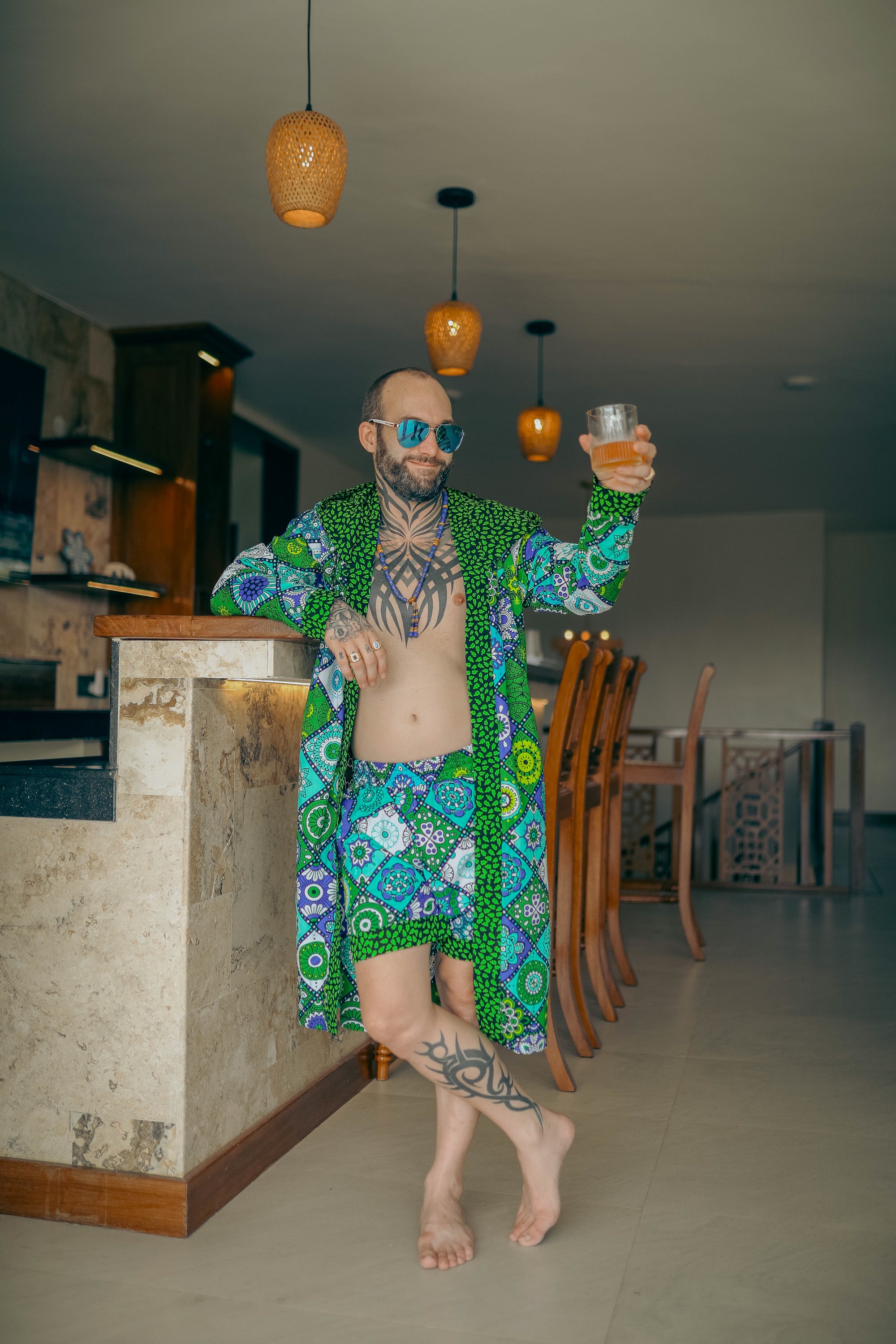Man wearing Mandala Bloom African cover-up and shorts set with vibrant mandala print – Zawadi Hat Fashion