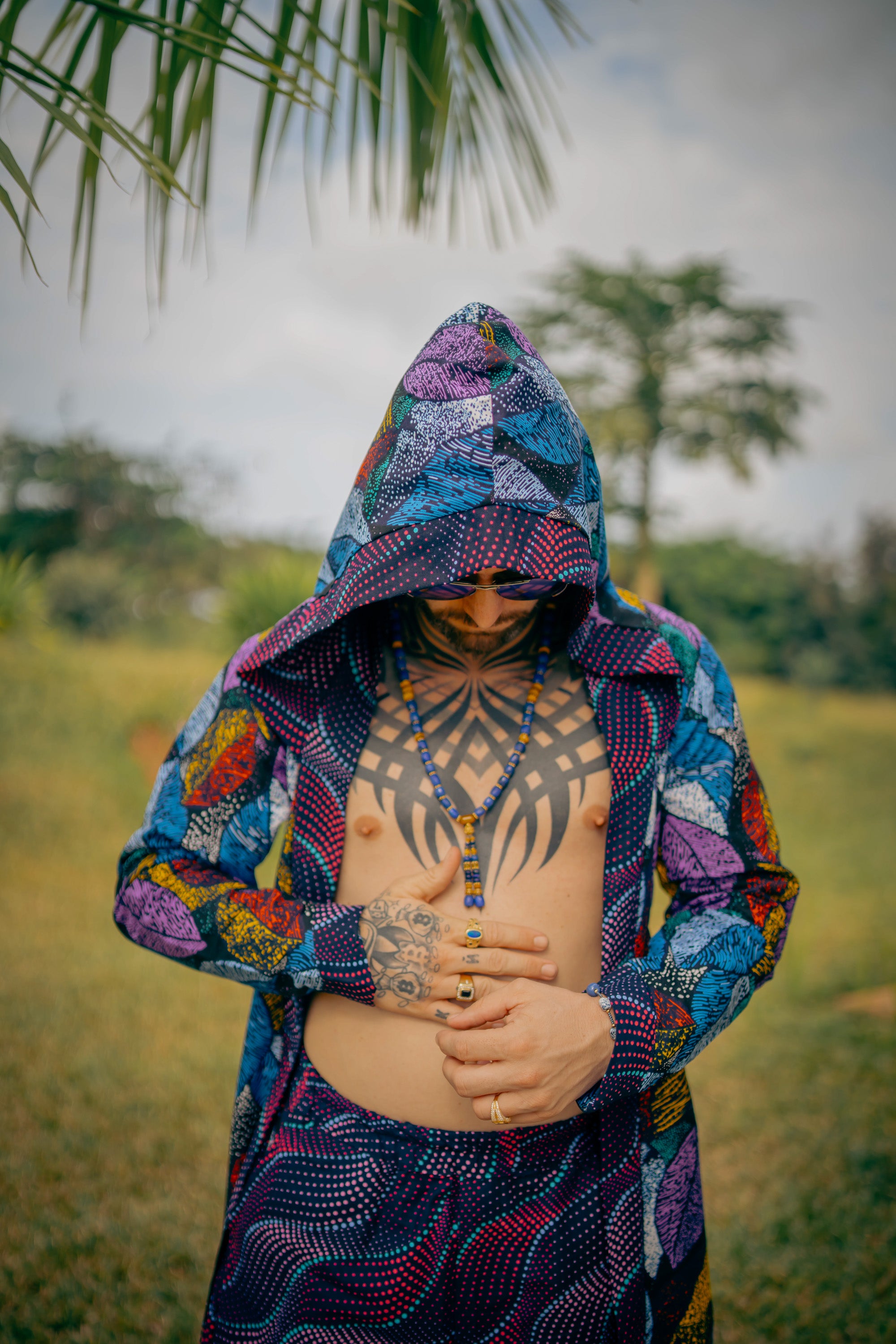 Man in Midnight Garden African cover-up and shorts with bold midnight floral design