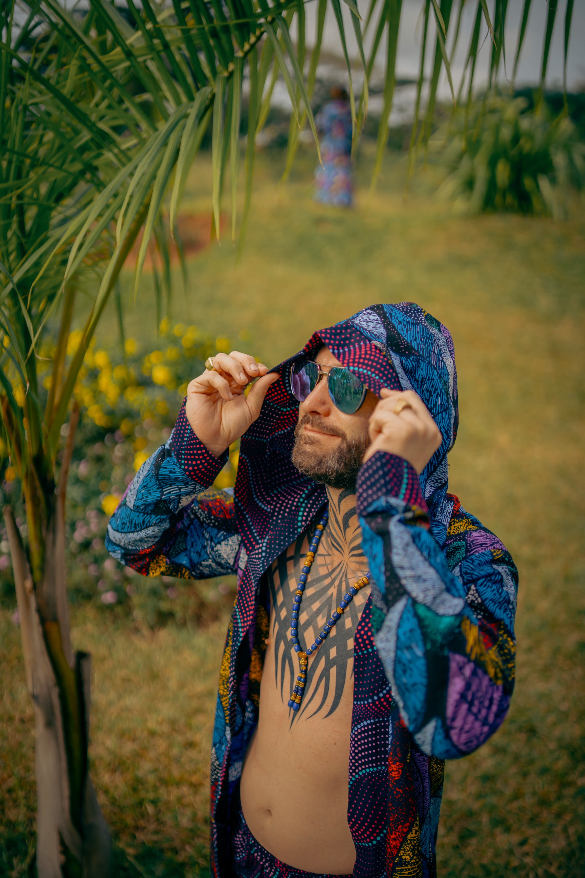 Man in Midnight Garden African cover-up with bold midnight floral design