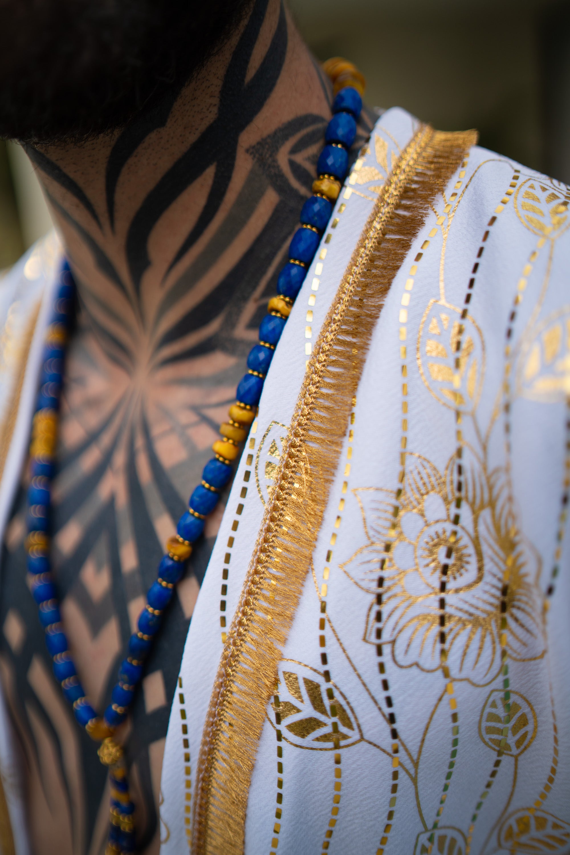 Close up white and Gold cover-up with golden accents