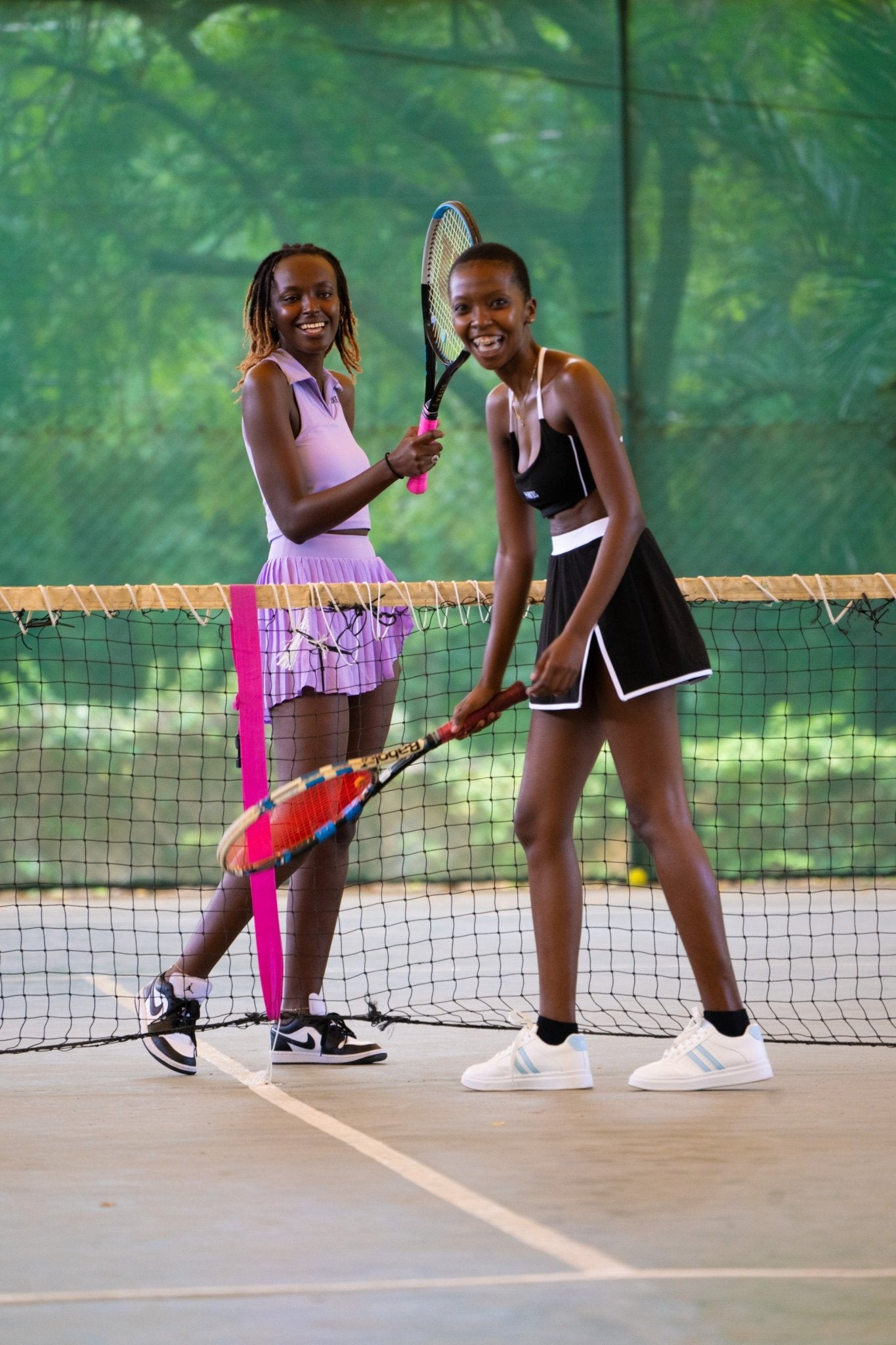 Poukies purple tennis set for couples; matching activewear top and bottoms, bold resort and gym look, Zawadi Hat Fashion