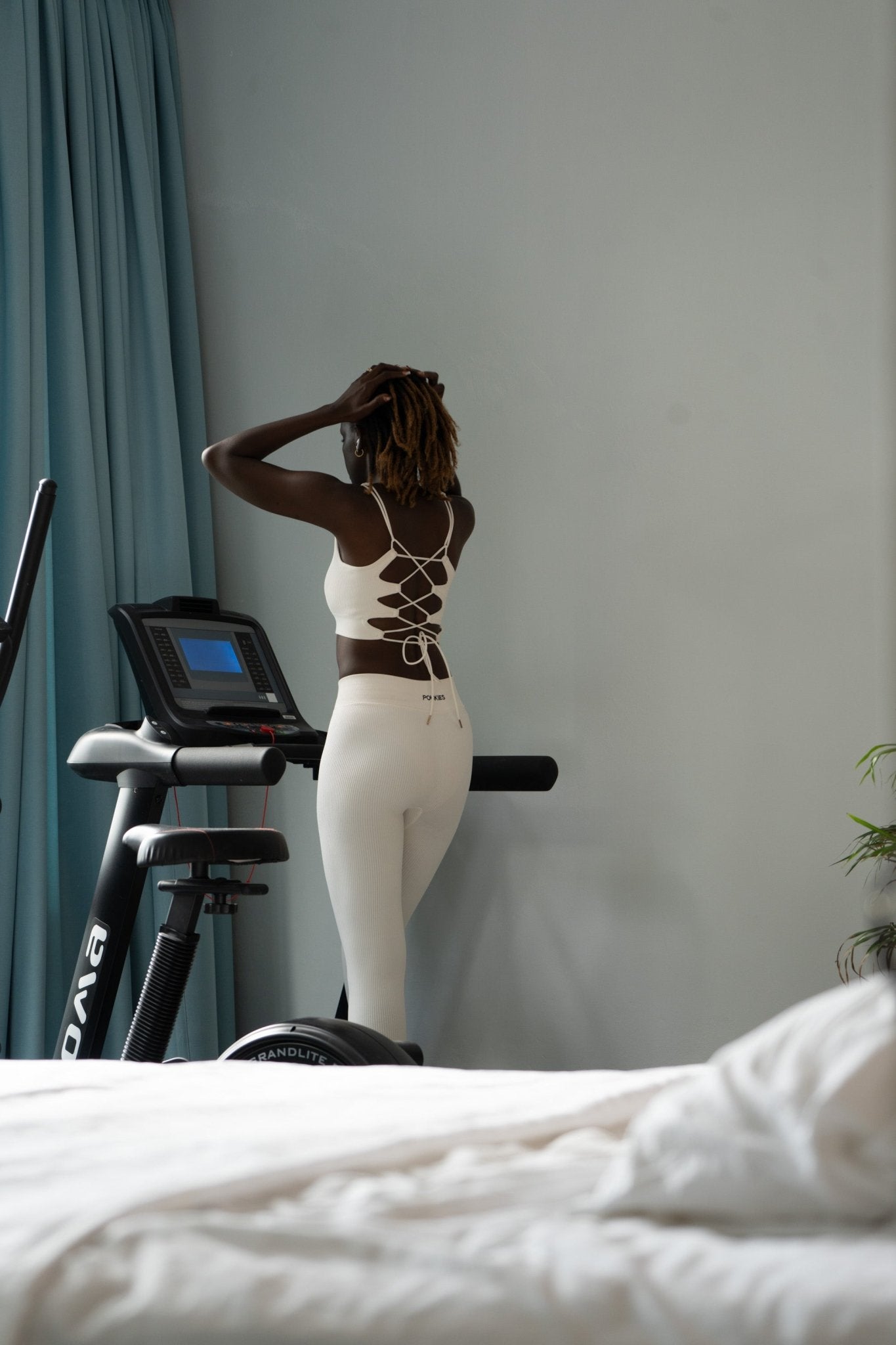 Poukies white gym set for couples; breathable matching top and bottoms, minimalist travel and resort activewear