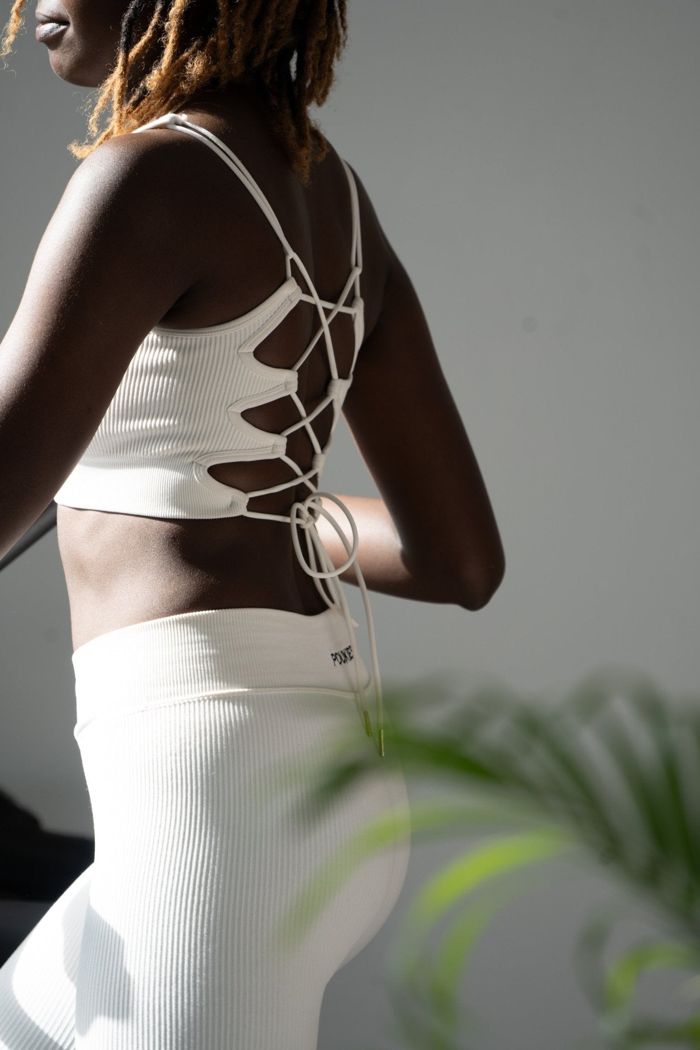 Poukies white gym set for couples; breathable matching top and bottoms, minimalist travel and resort activewear