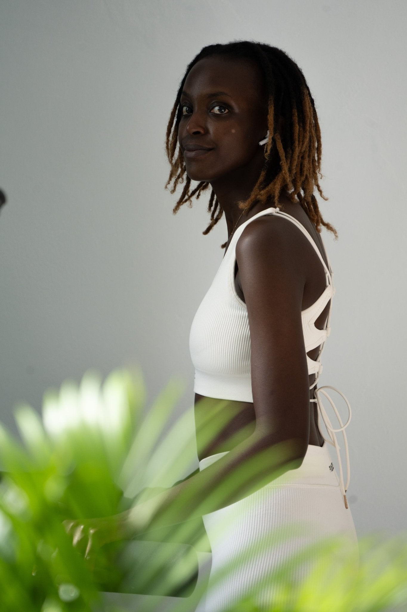 Poukies white gym set for couples; breathable matching top and bottoms, minimalist travel and resort activewear