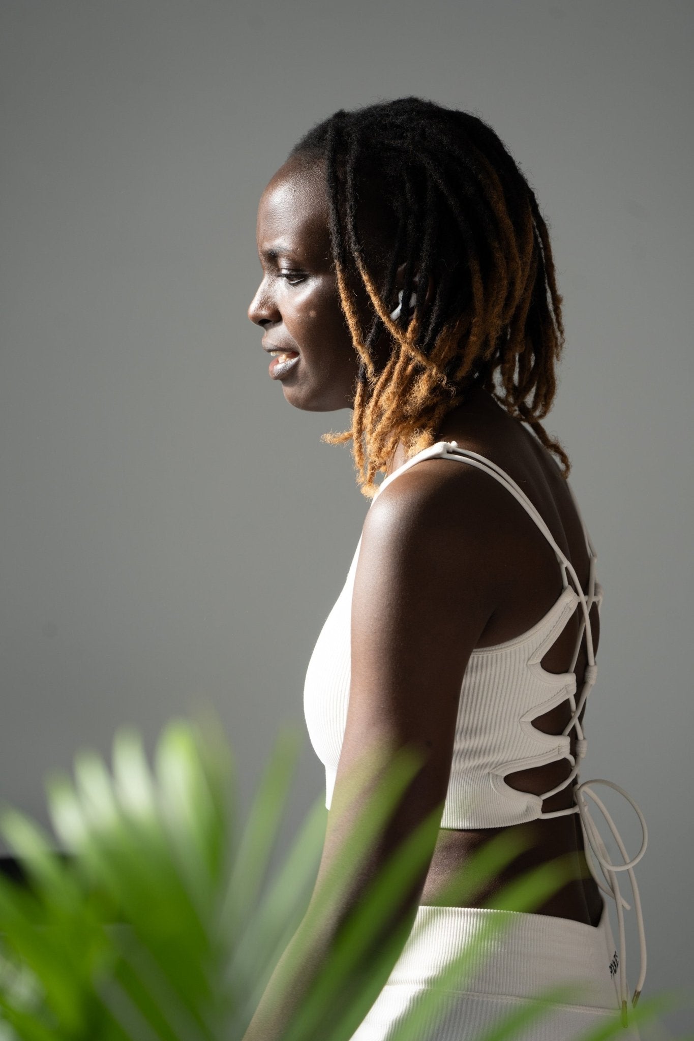 Poukies white gym set for couples; breathable matching top and bottoms, minimalist travel and resort activewear