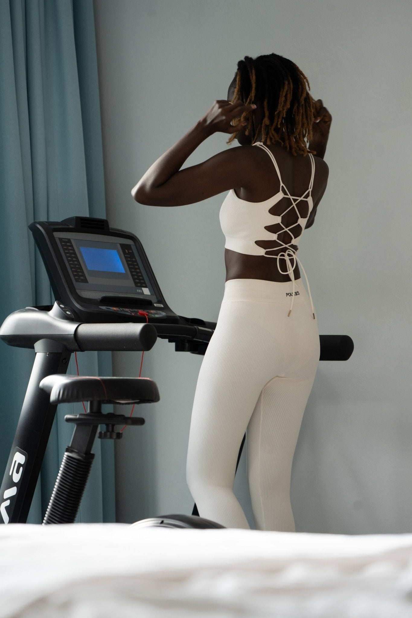 Poukies white gym set for couples; breathable matching top and bottoms, minimalist travel and resort activewear