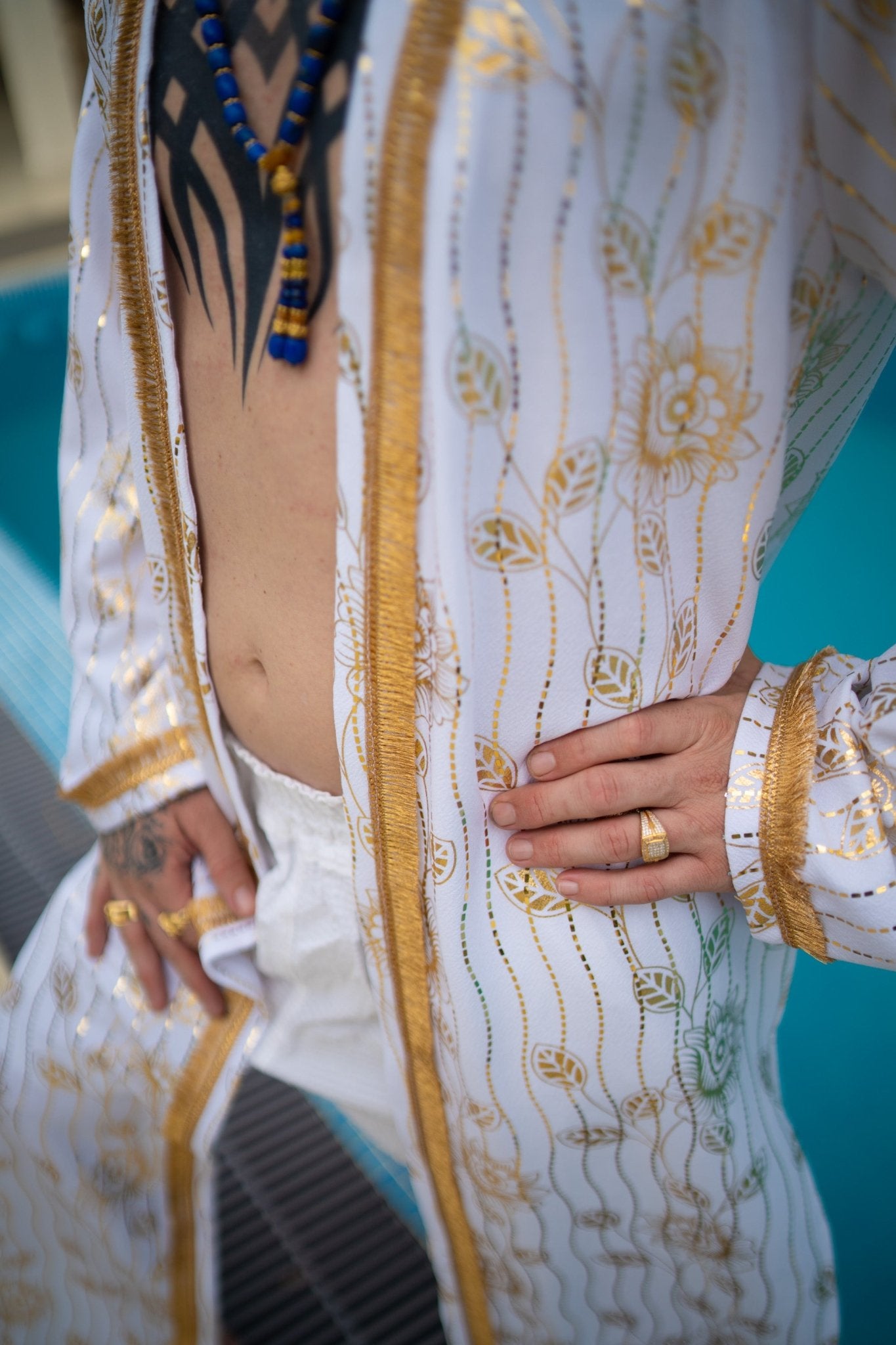 White and gold kimono cover-up with gol trim and removable belt; luxury resort, festival and party outfit, handmade in Kenya